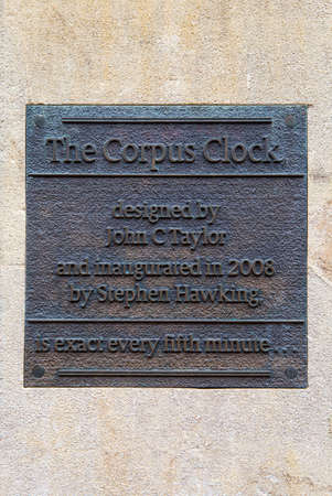 A plaque at the famous Corpus Clock in Cambridge, UK.のeditorial素材