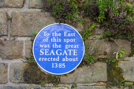 A blue plaque marking the location of the great western Seagate erected in about 1385 to block the...