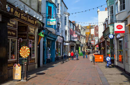 HASTINGS, UK - APRIL 1ST 2016: A view down George Street - one of the streets in the old town area of Hastings in Sussex, on 1st April 2016.のeditorial素材