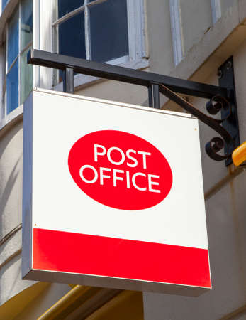 A Post Office sign in an English town.のeditorial素材