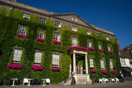 The impressive Georgian architecture of The Angel hotel in Bury St. Edmunds.  The hotel was used by Charles Dickens and was mentioned in The Pickwick Papers.のeditorial素材