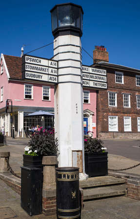 BURY ST EDMUNDS, UK - JULY 19TH 2016: An unusual directional sign in Bury St. Edmunds town centre, on 19th July 2016.のeditorial素材