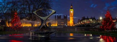 A view of a beautiful illuminated Christmas tree with the Houses of Parliament in the background,...