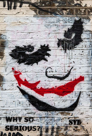 LONDON, UK - JANUARY 13TH 2016: Urban Street Art by Syd portraying The Joker from the Batman movie, in East London on 13th January 2016.のeditorial素材