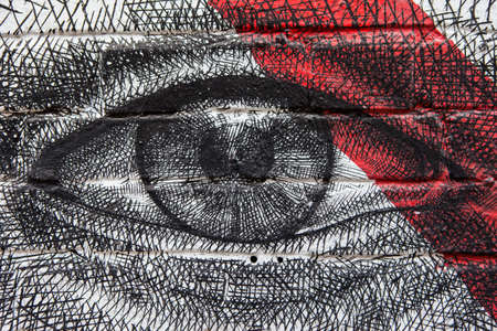 LONDON, UK - JANUARY 13TH 2016: Close-up shot of urban street art depicting an eye, located in East London, on 13th January 2016.のeditorial素材