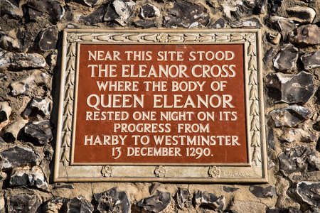 A plaque on St. Albans Clock Tower marking the location where the Eleanor Cross once stood.  It is where the body of Queen Eleanor rested for one night on its way to Westminster in 1290.の写真素材