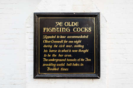 ST. ALBANS, UK - JANUARY 5TH 2017: An information board at Ye Old Fighting Cocks public house in St....