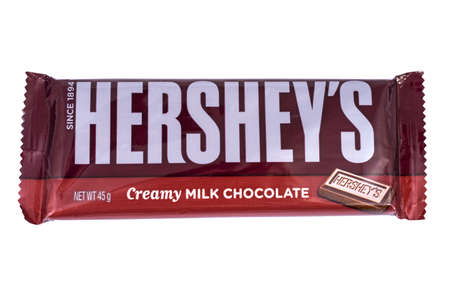 LONDON, UK - JANUARY 4TH 2017: A studio shot of a Hersheys Creamy Milk Chocolate Bar, isolated over a plain white background, on 4th January 2017.  Hersheys is one of the largest chocolate manufacturers in the USA.のeditorial素材