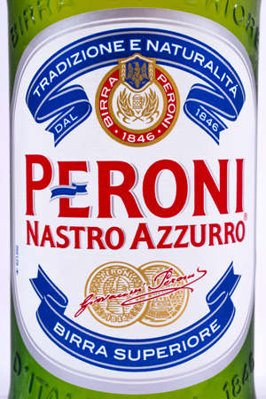 LONDON, UK - JANUARY 4TH 2017: A close-up of the label on a bottle of Peroni lager, on 4th January 2017.  Peroni Brewery is a brewing company, founded in Vigevano in Lombardy, Italy, in 1846.のeditorial素材