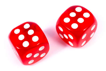 Two red dice isolated over a plain white background.の写真素材