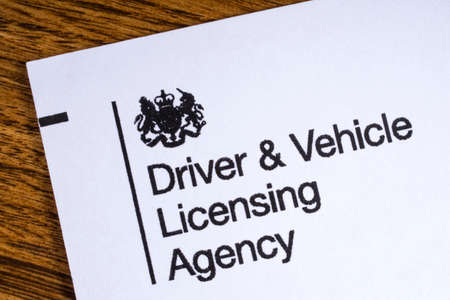 LONDON, UK - JANUARY 13TH 2017: The logo for the Driving and Vehicle Licensing Agency on the corner...