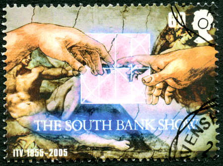 GREAT BRITAIN - CIRCA 2005: A used postage stamp from the UK, celebrating The South Bank Show television programme then aired on the ITV channel, circa 2005.のeditorial素材