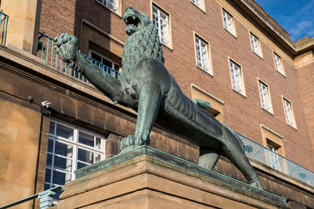 A heraldic lion outside the entrance to Norwich City Hall in the historic city of Norwich, UK.のeditorial素材