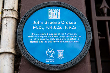 NORWICH, UK - JANUARY 17TH 2017: A blue plaque marking the location where celebrated surgeon John Greene Crosse once lived, taken in Norwich on 17th January 2017.のeditorial素材