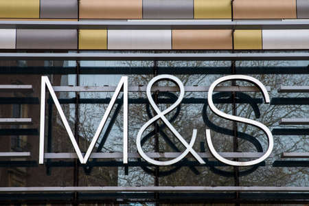 NORWICH, UK - JANUARY 17TH 2017: The M&S logo above the entrance to the Marks and Spencer store in Norwich city centre, on 17th January 2017.のeditorial素材