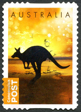 AUSTRALIA - CIRCA 2014: A used postage stamp from Australia, depicting a silhouette of a Kangaroo, circa 2014.のeditorial素材