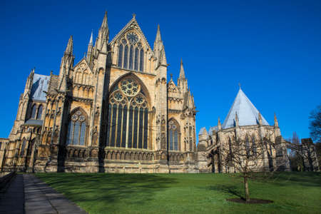 A view of the eastern facade of Lincoln Cathedral and the Chapter House in the historic city of...