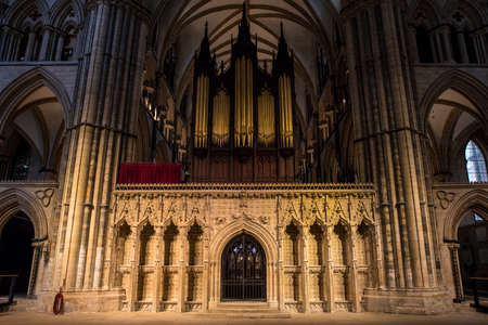 LINCOLN, UK - FEBRUARY 27TH 2017: A view of the beautifully sculptured Choir Screen and Organ of Lincoln Cathedral in the historic city of Lincoln, UK, on 27th February 2017.のeditorial素材
