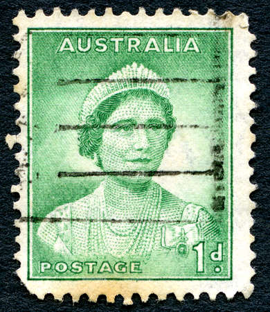 AUSTRALIA - CIRCA 1937: A used postage stamp from Australia, depicting a portrait of Elizabeth Bowes Lyon, later affectionately known as the Queen Mother, circa 1937.のeditorial素材