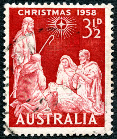 AUSTRALIA - CIRCA 1958: A used postage stamp from Australia, depicting a festive biblical scene for Christmas, circa 1958.のeditorial素材