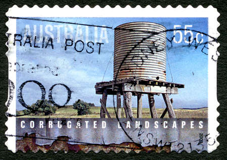AUSTRALIA - CIRCA 2009: A used postage stamp from Australia, celebrating corrugated landscapes and architecture, circa 2009.のeditorial素材