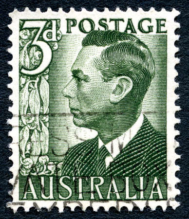 AUSTRALIA - CIRCA 1950: A used postage stamp from Australia, depicting a portrait of King George VI, circa 1950.のeditorial素材