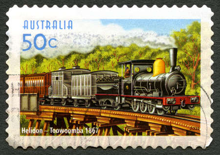 AUSTRALIA - CIRCA 2004: A used postage stamp from Australia, commemorating the train service between Helidon and Toowoomba, circa 2004.のeditorial素材