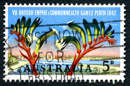 AUSTRALIA - CIRCA 1962: A used postage stamp from Australia, commemorating the 7th British Empire and Commonwealth Games held in Perth, circa 1962.のeditorial素材