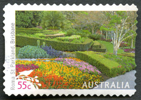 AUSTRALIA - CIRCA 2009: A used postage stamp from Australia, depicting an image of Roma Street Parkland in Brisbane, circa 2009.のeditorial素材