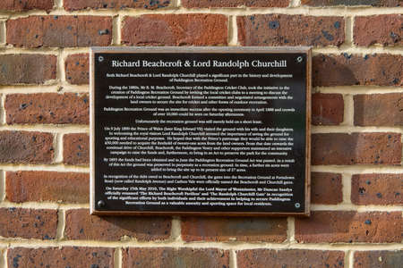 A plaque in Paddington Recreation Ground, detailing its history and the important role that Richard Beachcroft and Lord Randolph Churchill played in making the ground a valuable amenity for local people.のeditorial素材