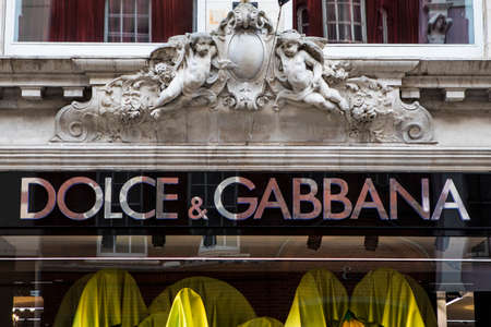 LONDON, UK - FEBRUARY 16TH 2017: A sign for the Dolce and Gabbana shop on New Bond Street in central London, on 16th February 2017.のeditorial素材