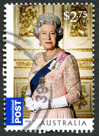 AUSTRALIA - CIRCA 2015: A used postage stamp from Australia, depicting a portrait of Queen Elizabeth II, circa 2015.のeditorial素材