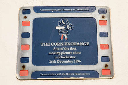 CHICHESTER, UK - APRIL 29TH 2017: A plaque on the Corn Exchange in Chichester, detailing the site of the first moving picture show in the city in 1896, taken on 29th April 2017.のeditorial素材