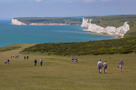 EAST SUSSEX, UK - MAY 25TH 2017: The view towards Birling Gap and the Seeven Sisters Chalk Cliffs in East Sussex, UK, on 25th May 2017.のeditorial素材