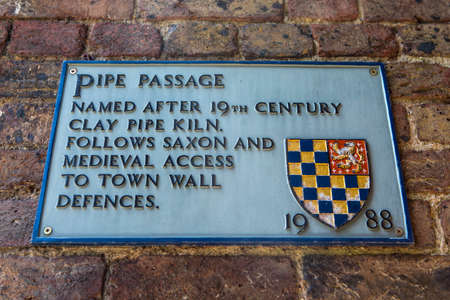 LEWES, UK - MAY 31ST 2017: A plaque at Pipe Passage in the historic town of Lewes in East Sussex, UK, on 31st May 2017.のeditorial素材