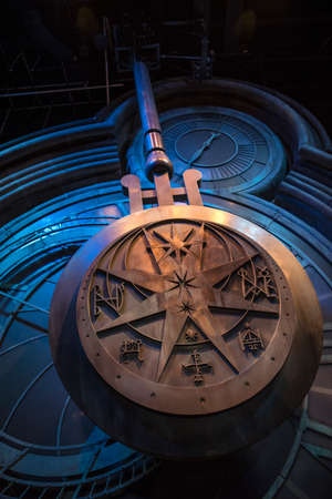 LEAVESDEN, UK - JUNE 19TH 2017: The swinging clock tower pendulum prop, on display at the Making of Harry Potter Studio Tour at the Warner Bros. Studios in Leavesden, UK, on 19th June 2017.のeditorial素材