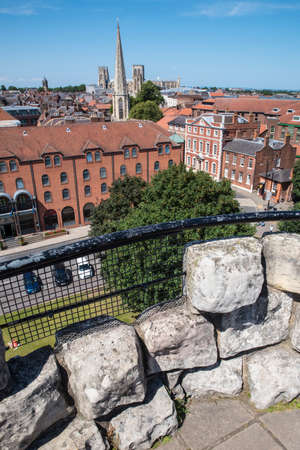 The view from Cliffords Tower in the historic city of York in England.  The view includes York Minster, St. Maryâs church, Fairfax House, and St. Wilfrids Roman Catholic church.のeditorial素材