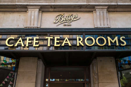 YORK, UK - JULY 18TH 2017: The Bettys sign above the entrance to Bettys Cafe Tea Rooms in the city...
