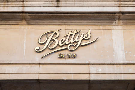 YORK, UK - JULY 18TH 2017: The Bettys sign above the entrance to Bettys Cafe Tea Rooms in the city of York in England, on 18th July 2017.のeditorial素材