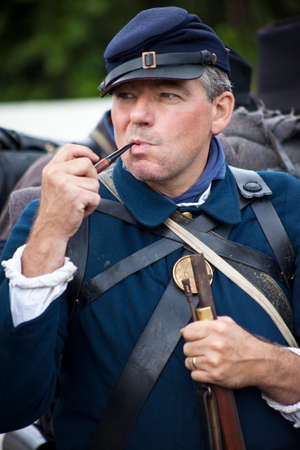 KENT, UK - AUGUST 28TH 2017: Actor posing as a Union soldier from the American Civil War, at the Military Odyssey Re-enactment event in Detling, Kent, on 28th August 2017.のeditorial素材