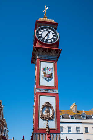 The Jubilee clock on Weymouth seafront in Dorset, UK.  The clock was erected in 1887 to mark the 50th year of the reign of Queen Victoria.のeditorial素材