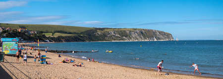 A panoramic view of the beautiful seafront and coastline at Swanage in the county of Dorset, UK.のeditorial素材