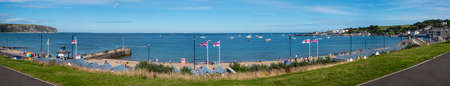 A panoramic view of the beautiful seafront and coastline at Swanage in the county of Dorset, UK.のeditorial素材