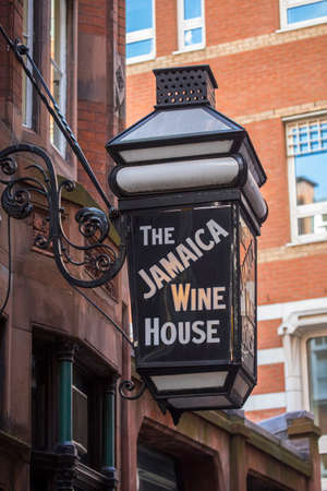 LONDON, UK - AUGUST 25TH 2017: The traditional sign to the Jamaica Wine House located in St. Michaels Alley in the City of London, UK, on 25th August 2017.  It is known as the first coffee house in London.のeditorial素材