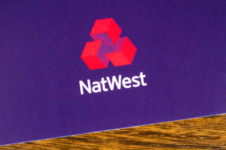 LONDON, UK - DECEMBER 18TH 2017: Close-up of the Natwest bank logo on a promotional leaflet, on 18th December 2017.のeditorial素材