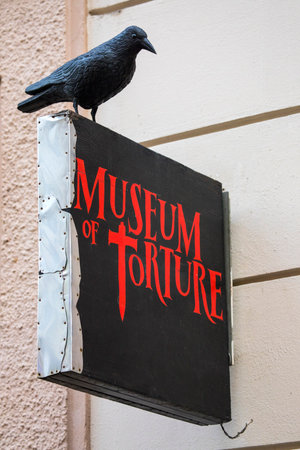 PRAGUE, CZECH REPUBLICH - DECEMBER 23RD 2017: A sign above the entrance to the Museum of Torture, located in the old town area of the city of Prague, Czech Republic, on 23rd December 2017のeditorial素材