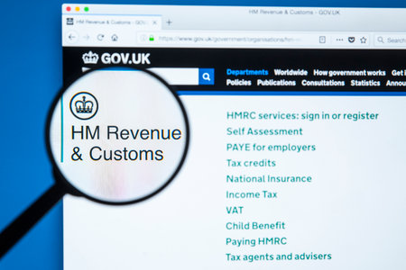 LONDON, UK - JANUARY 8TH 2018: The HM Revenue & Customs website magnified under a spy glass, on 8th...