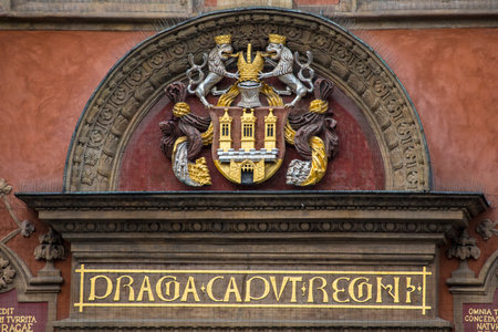 The beautifully sculpted Coat of Arms for the city of Prague.  Located on a building in the Old Town Square in Prague, Czech Republic.のeditorial素材