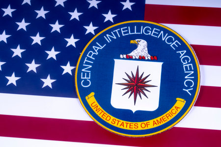LONDON, UK - MARCH 18TH 2018: The symbol of the Central Intelligence Agency pictured over the USA Flag, on 18th March 2018.  The CIA is a civilian foreign intelligence service of the US federal government.のeditorial素材