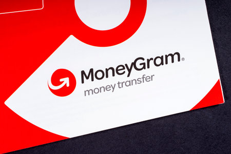 LONDON, UK - MARCH 27TH 2018: A close-up of the MoneyGram icon on an information leaflet, on 27th...